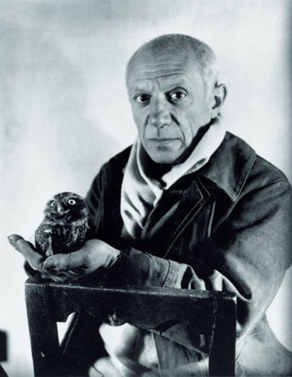 a photo of Pablo Picasso with his owl